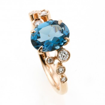 Anillo oro rosa topacio London Blue